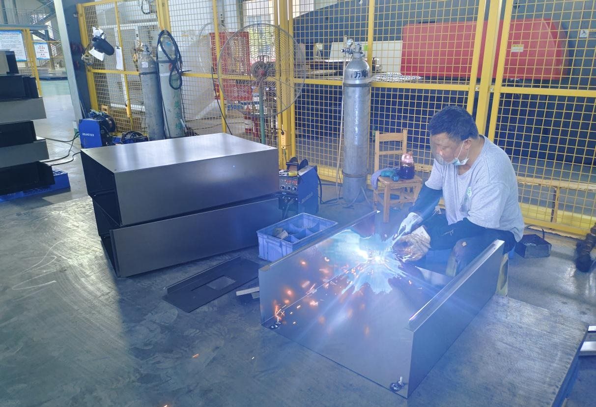 Welding process for cabinet enclosure parts
